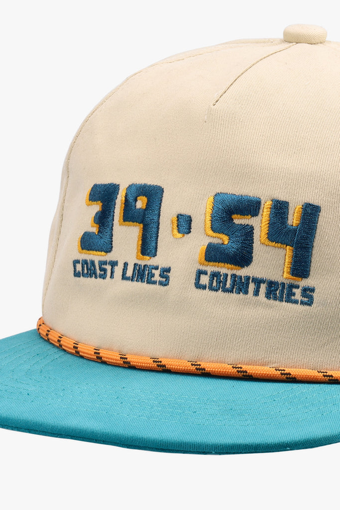 MW Trucker Cap front view with structured panel and curved brim - details.